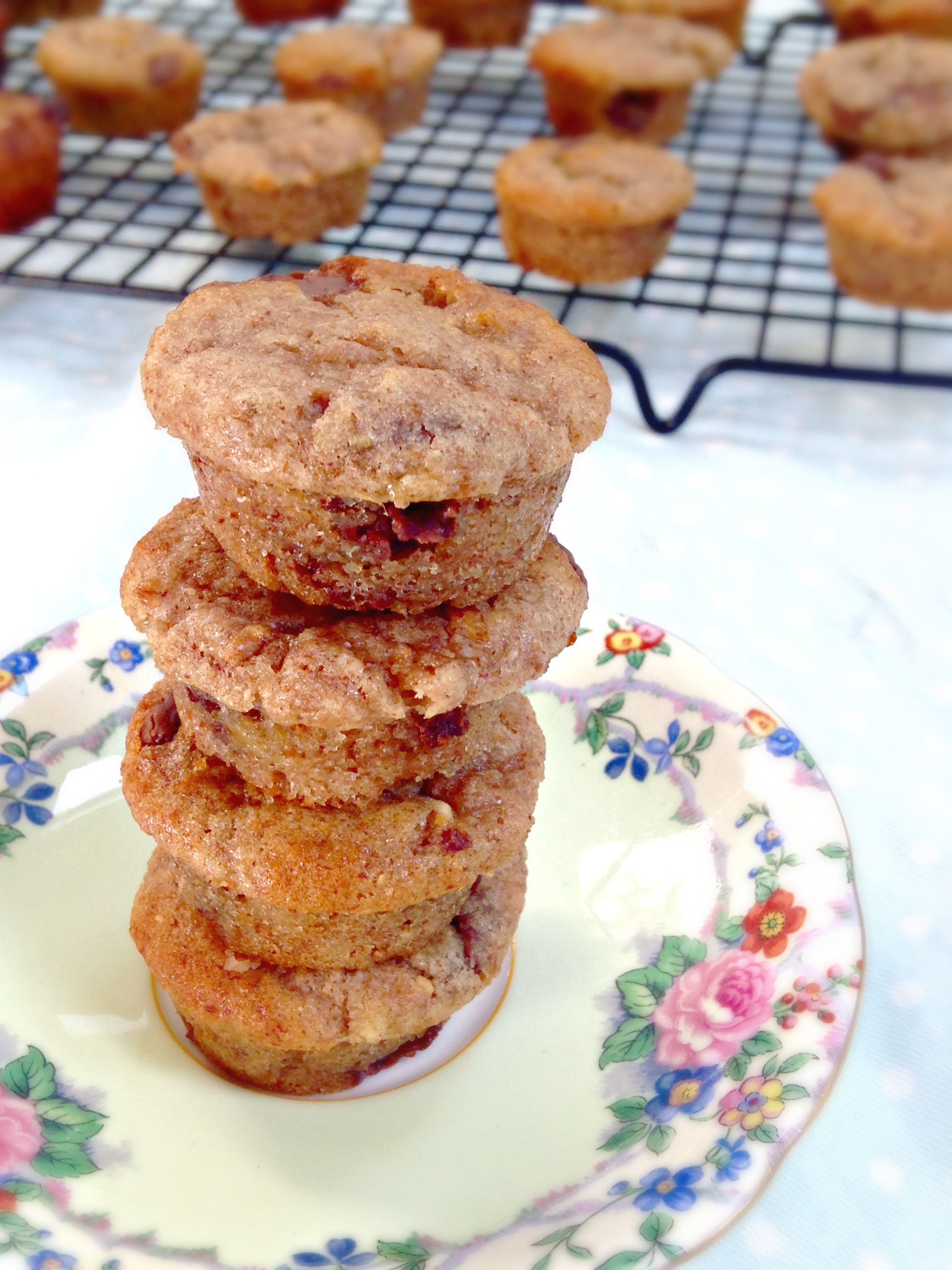 An easy deliciously addictive mini muffin recipe, incorporating peanut butter, chocolate chips, and banana bread goodness.