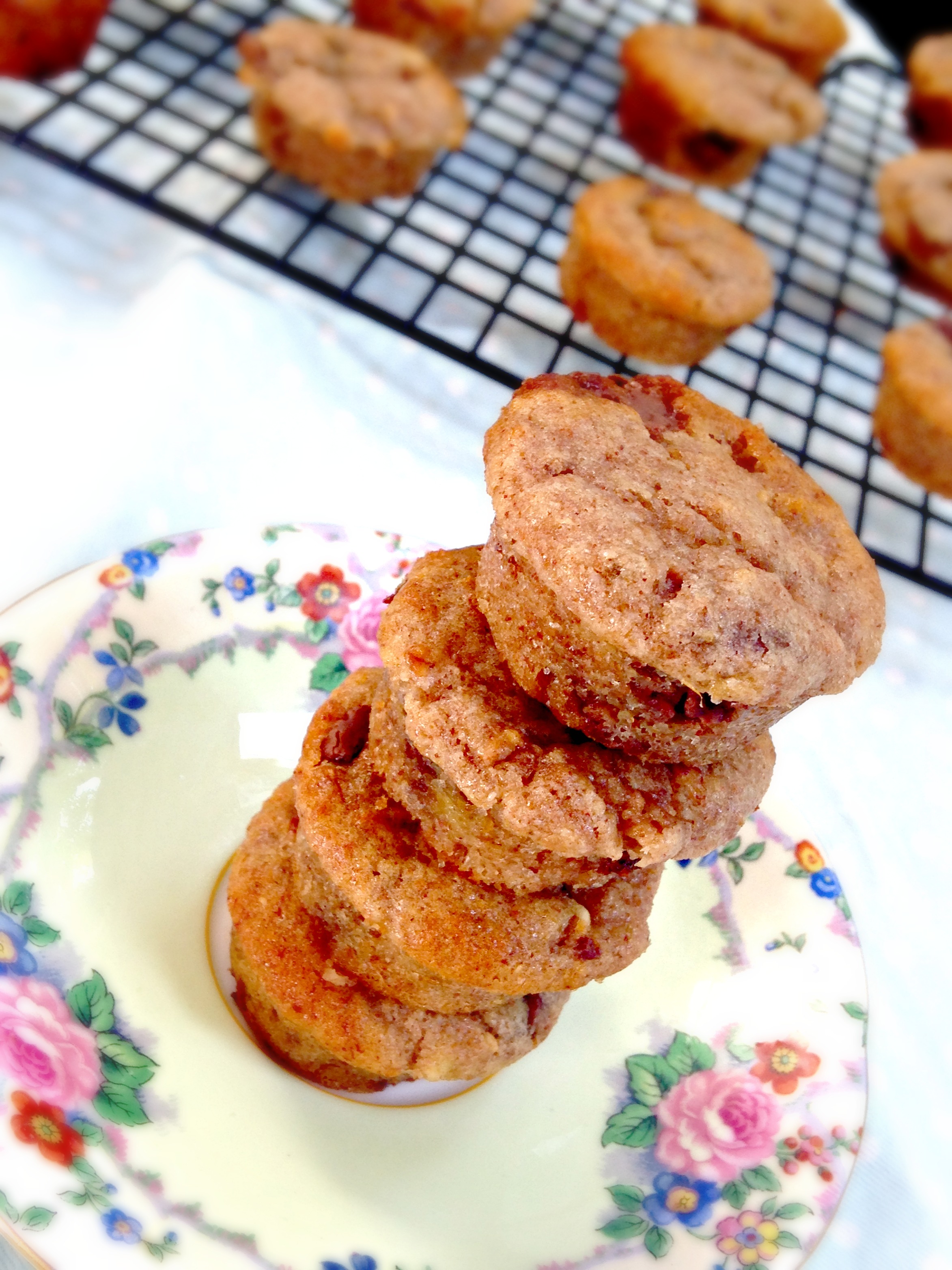 An easy deliciously addictive mini muffin recipe, incorporating peanut butter, chocolate chips, and banana bread goodness.