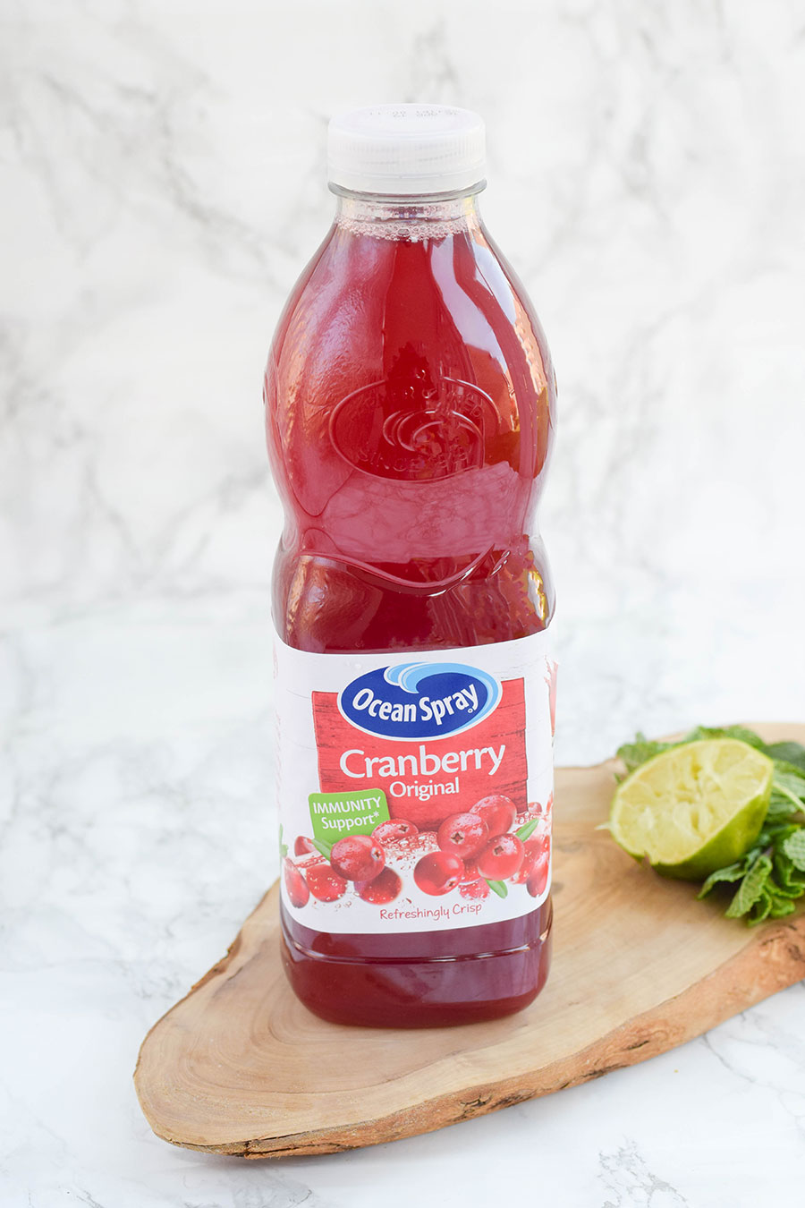 Cranberry Ginger Mojito is a twist on a classic!&nbsp; Sour cranberry juice is spiked with ginger beer and traditional mojito ingredients to produce a refreshing mocktail that would be perfect to serve at a BBQ, picnic or garden party.&nbsp;
