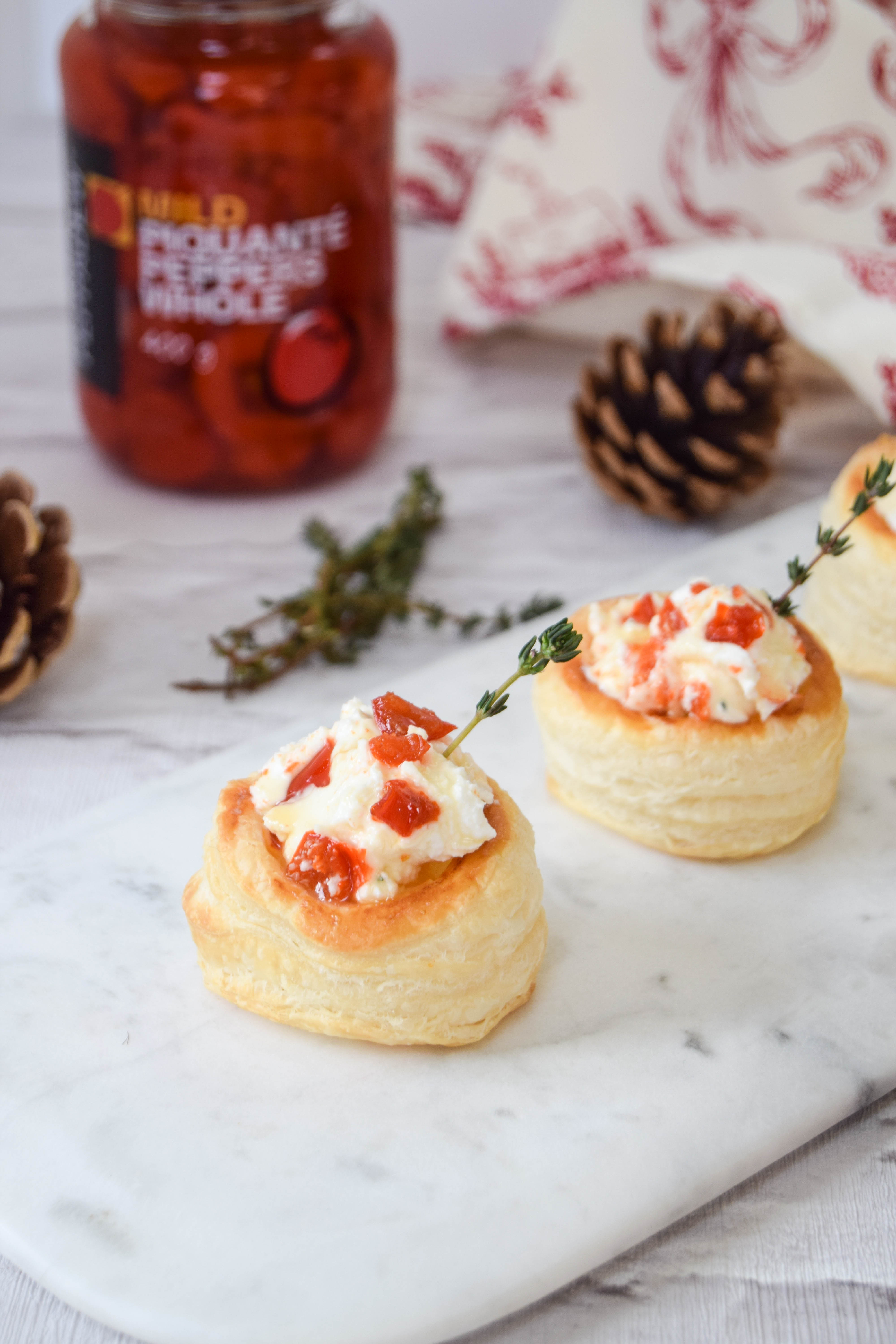 Perfect as canapes or a party, these vol-au-vents that are filled with creamy goat’s cheese, piquante peppers, honey and thyme are effortless to make.