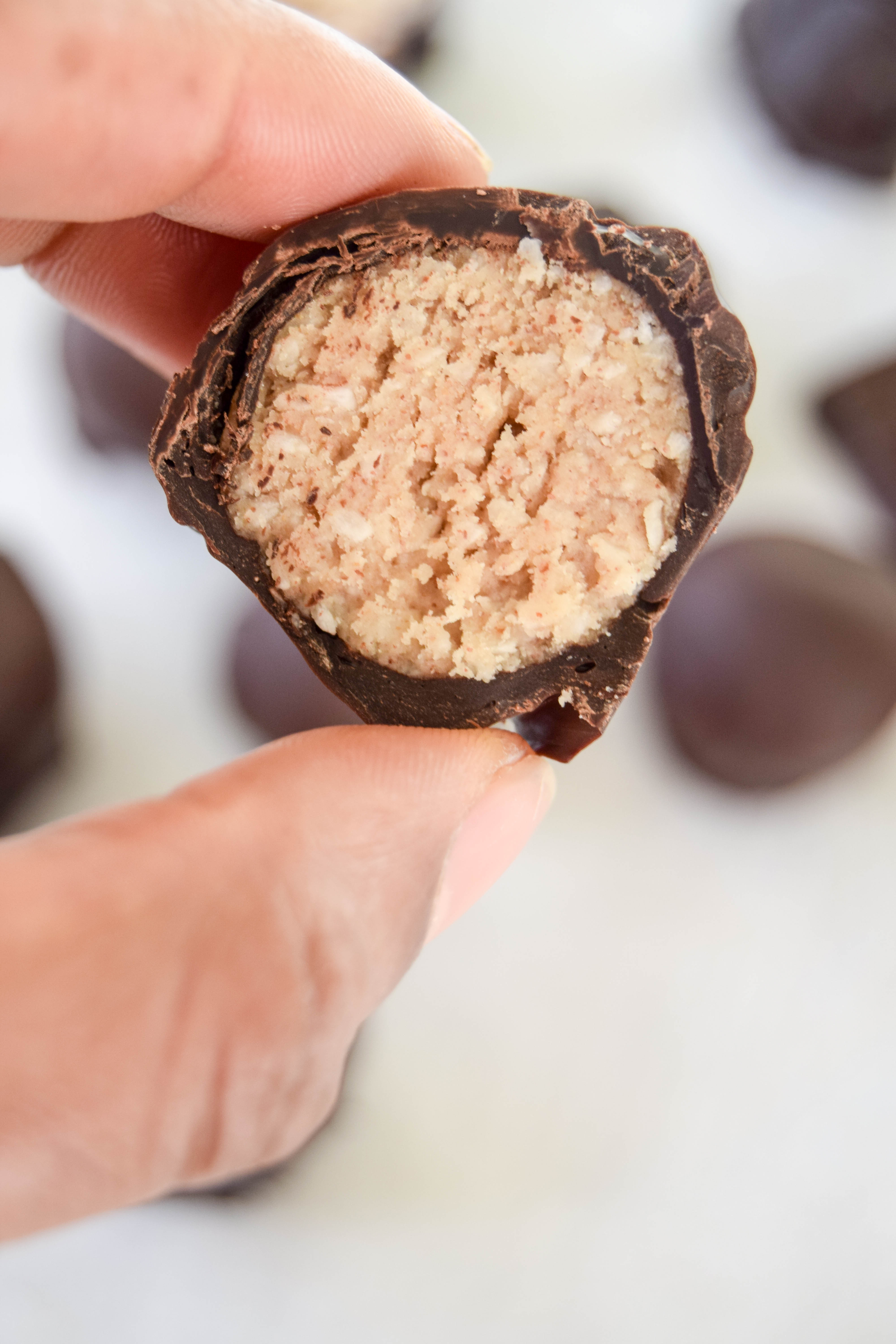 Homemade chocolate truffles with tasty peanut butter and coconut centres.
