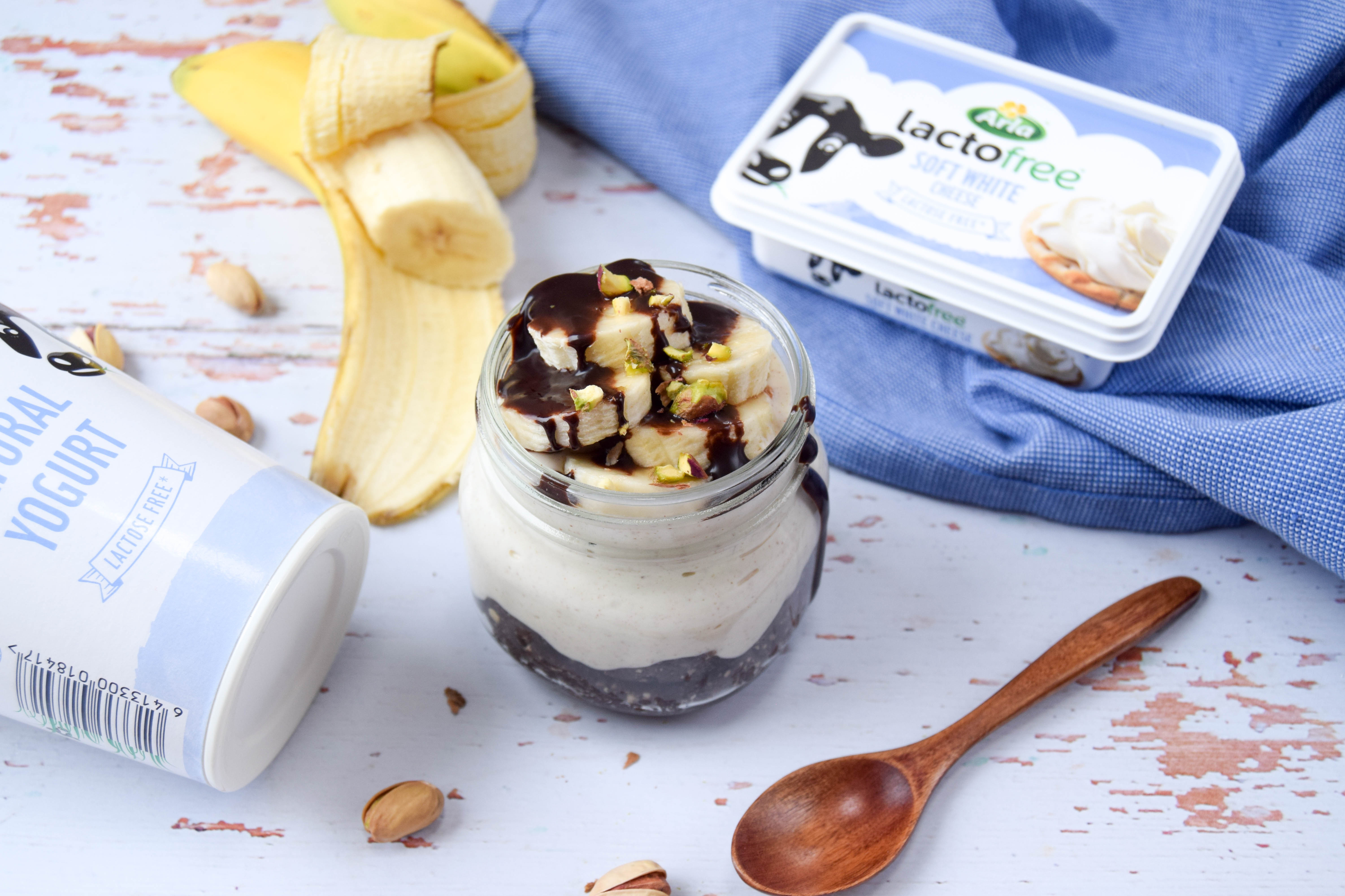 A healthier parfait dessert, made with a chocolate cookie base, creamy peanut butter filling and topped with chopped banana.