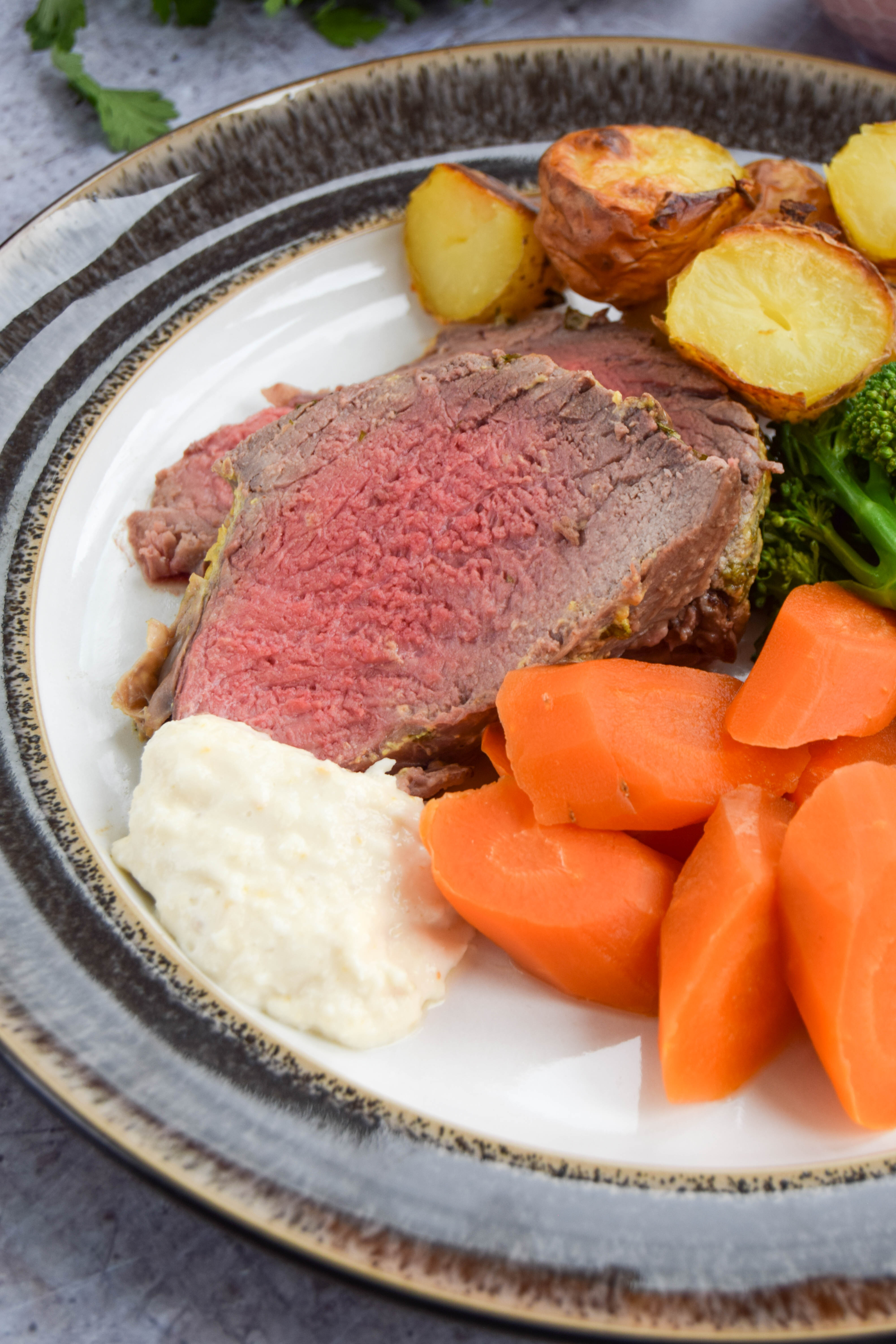 A beef mini roast coated in mustard butter and served with delicious seasonal vegetables. 