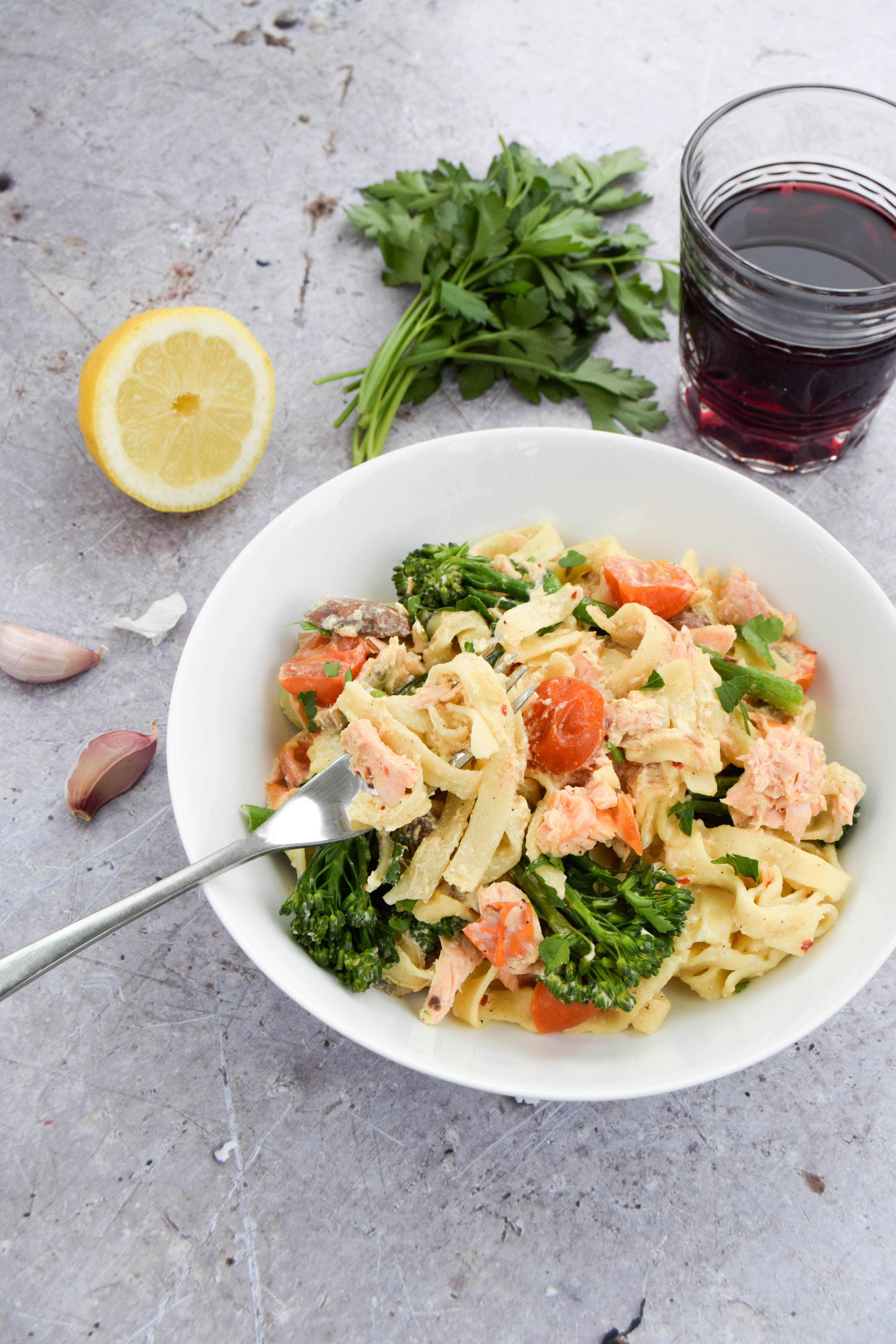 A summery pasta dish made with salmon and tenderstem broccoli and a creamy sauce made with quark. 
