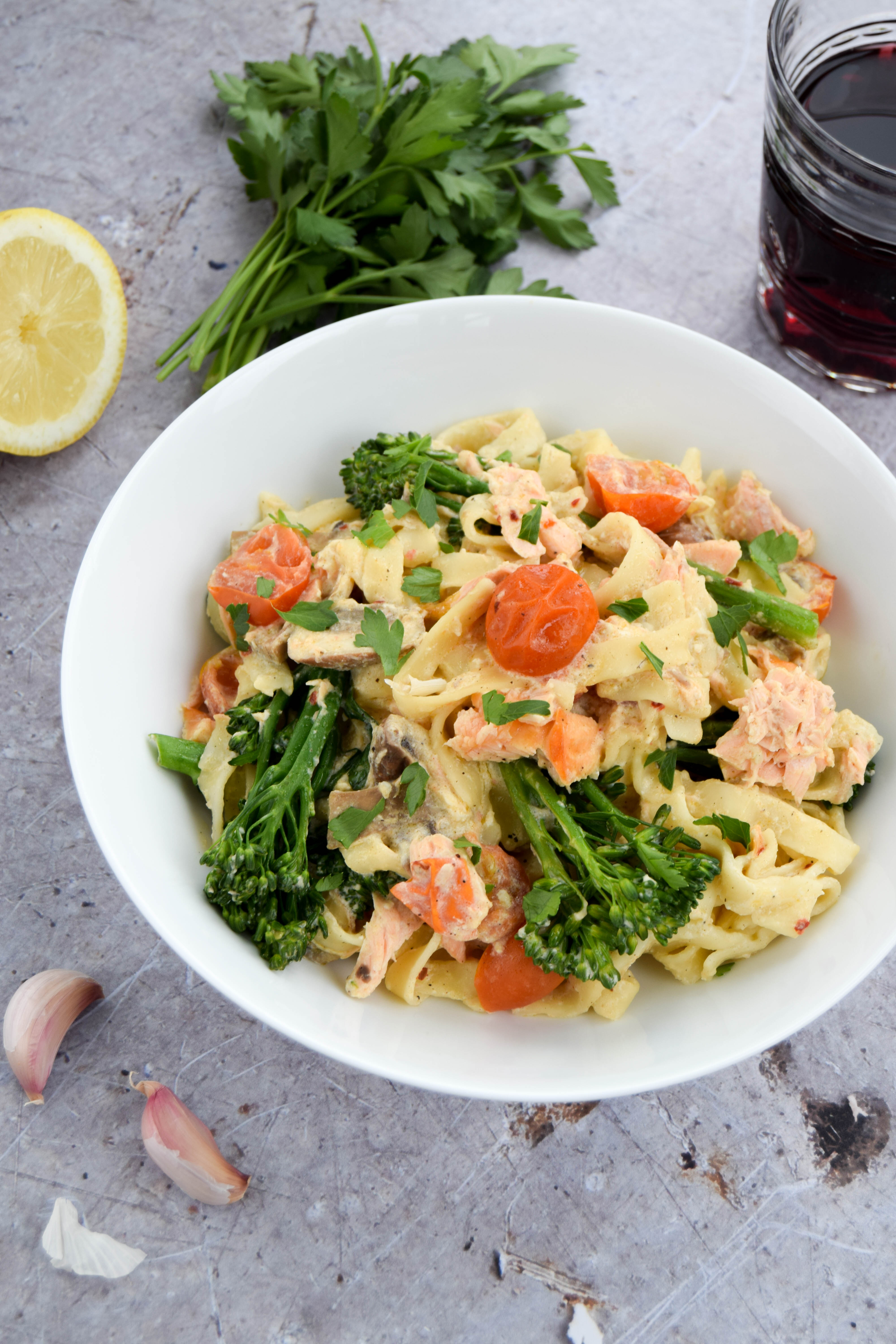 A summery pasta dish made with salmon and tenderstem broccoli and a creamy sauce made with quark. 