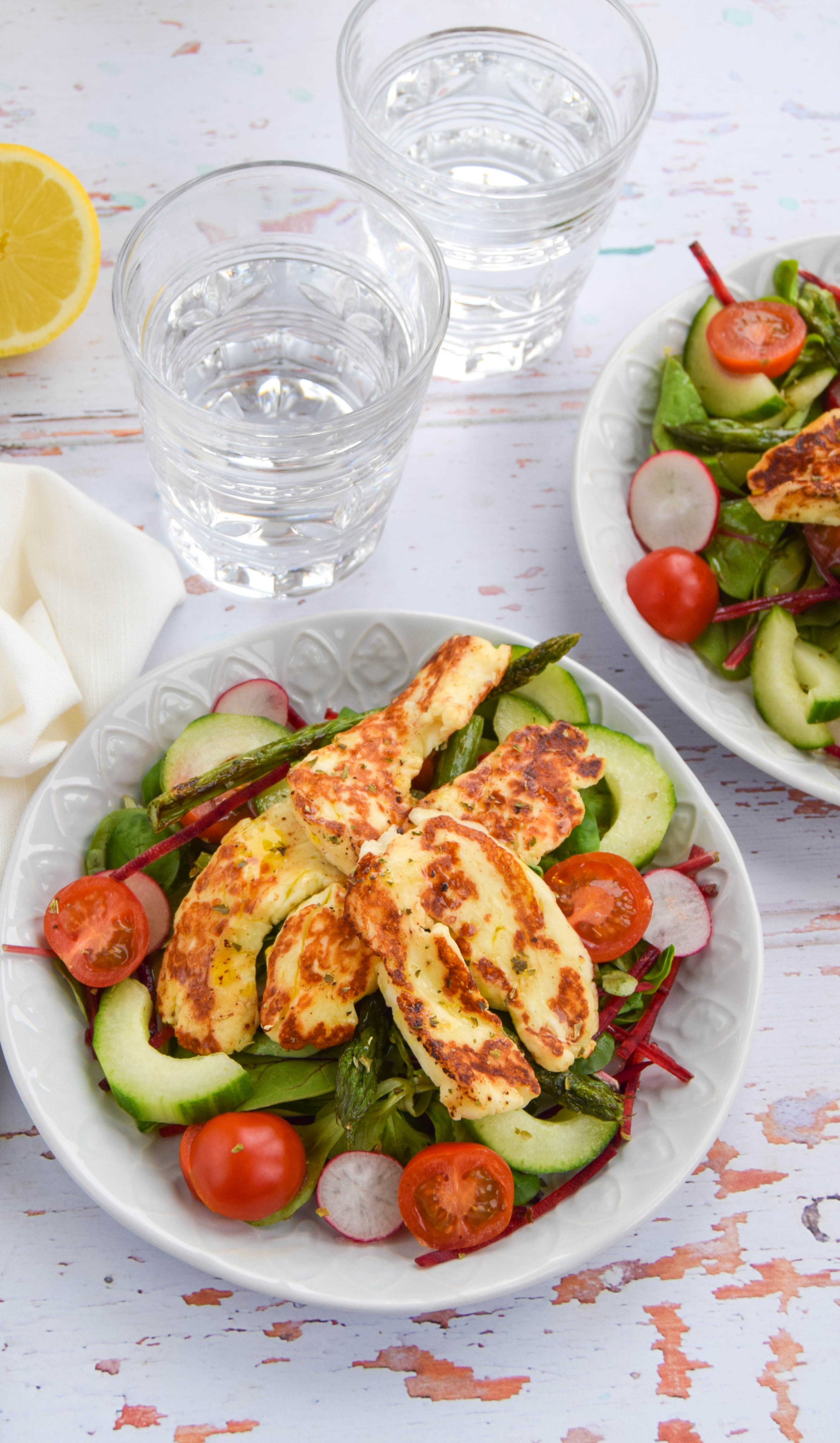 Seasonal British asparagus teamed up with salty halloumi cheese to create a vibrant and fresh summery salad. 