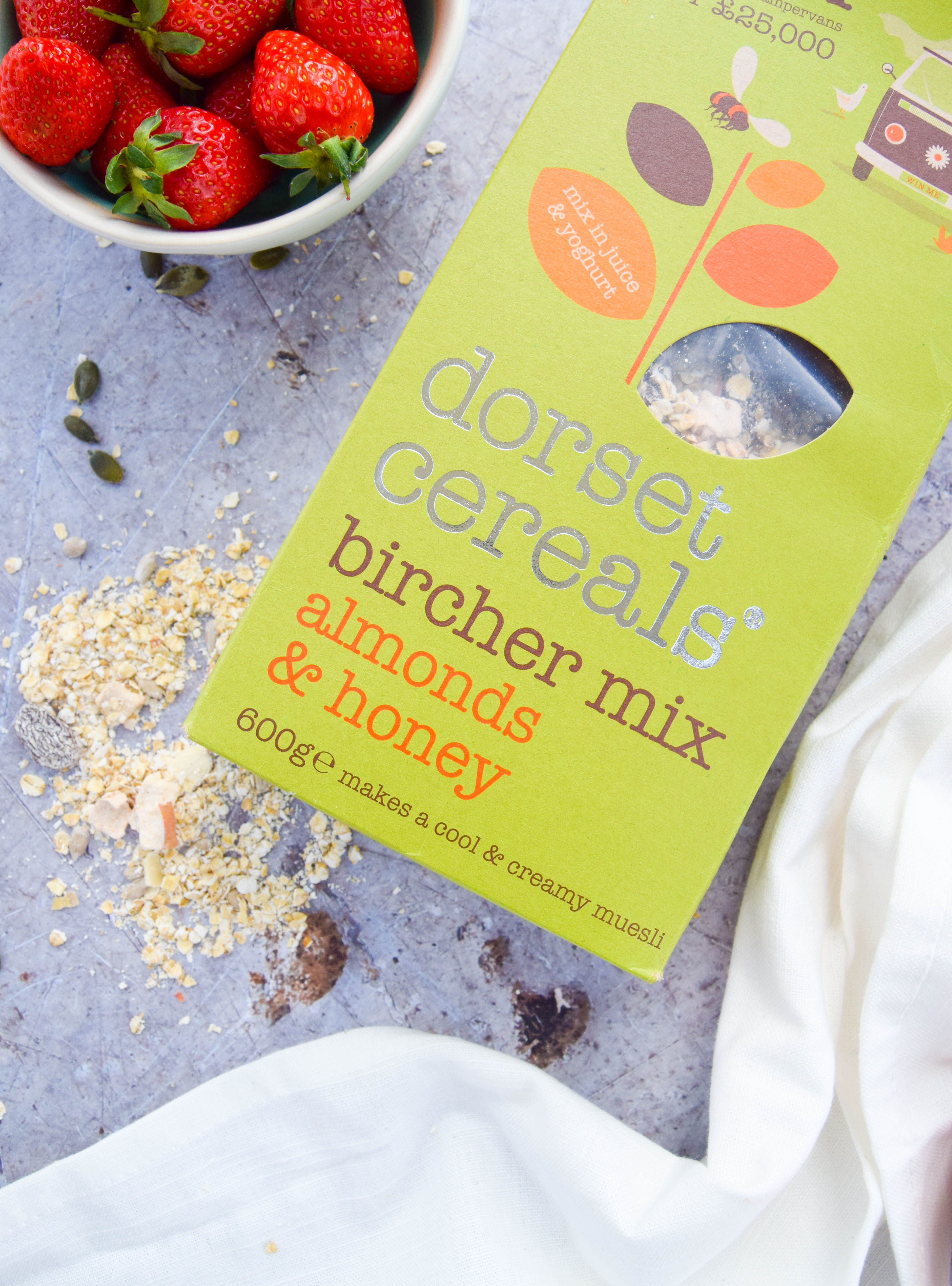 A creamy and cool bircher muesli recipe made with almonds and coconut and topped with sweet and sticky maple apricots. The perfect summer breakfast!