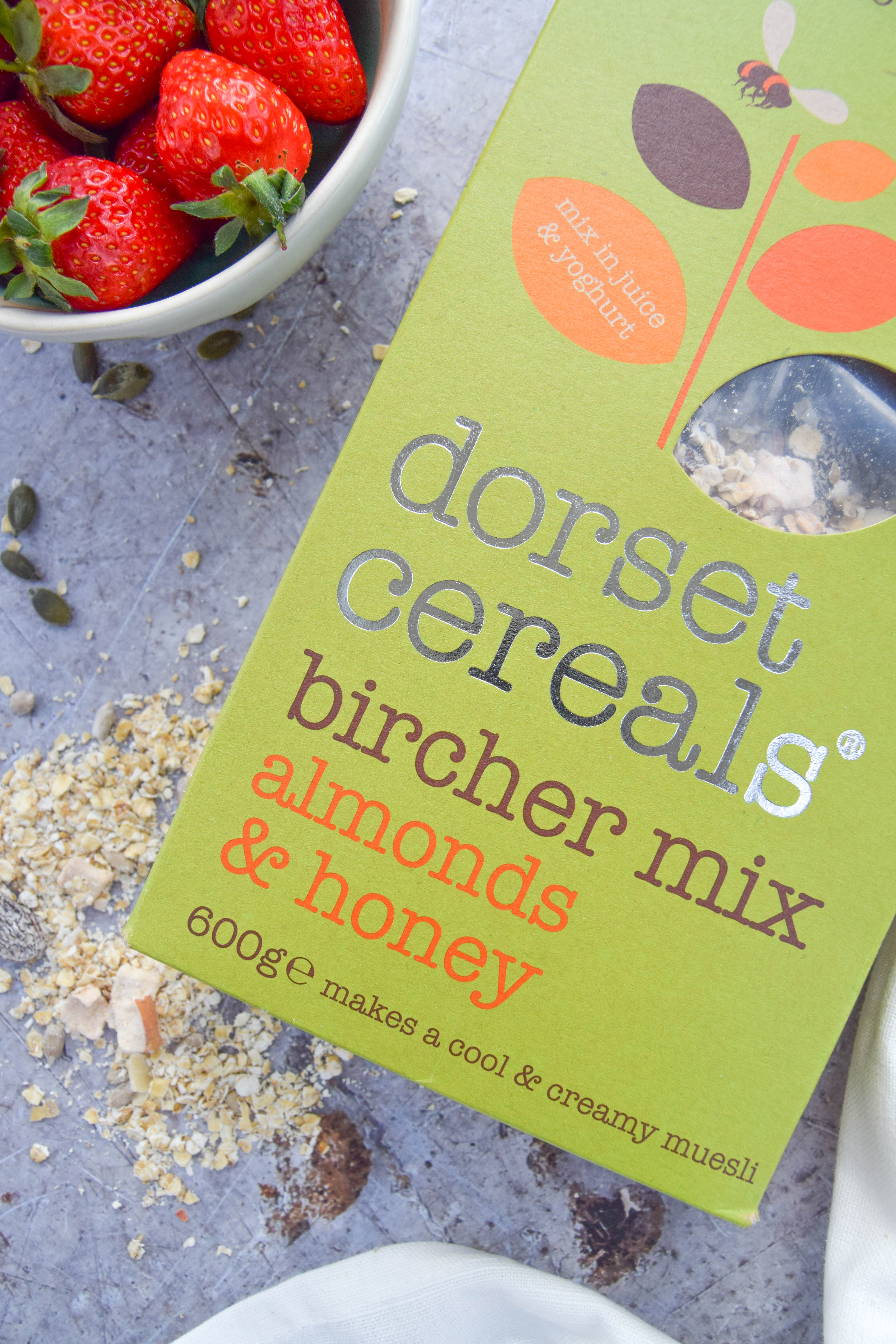 A creamy and cool bircher muesli recipe made with almonds and coconut and topped with sweet and sticky maple apricots. The perfect summer breakfast!