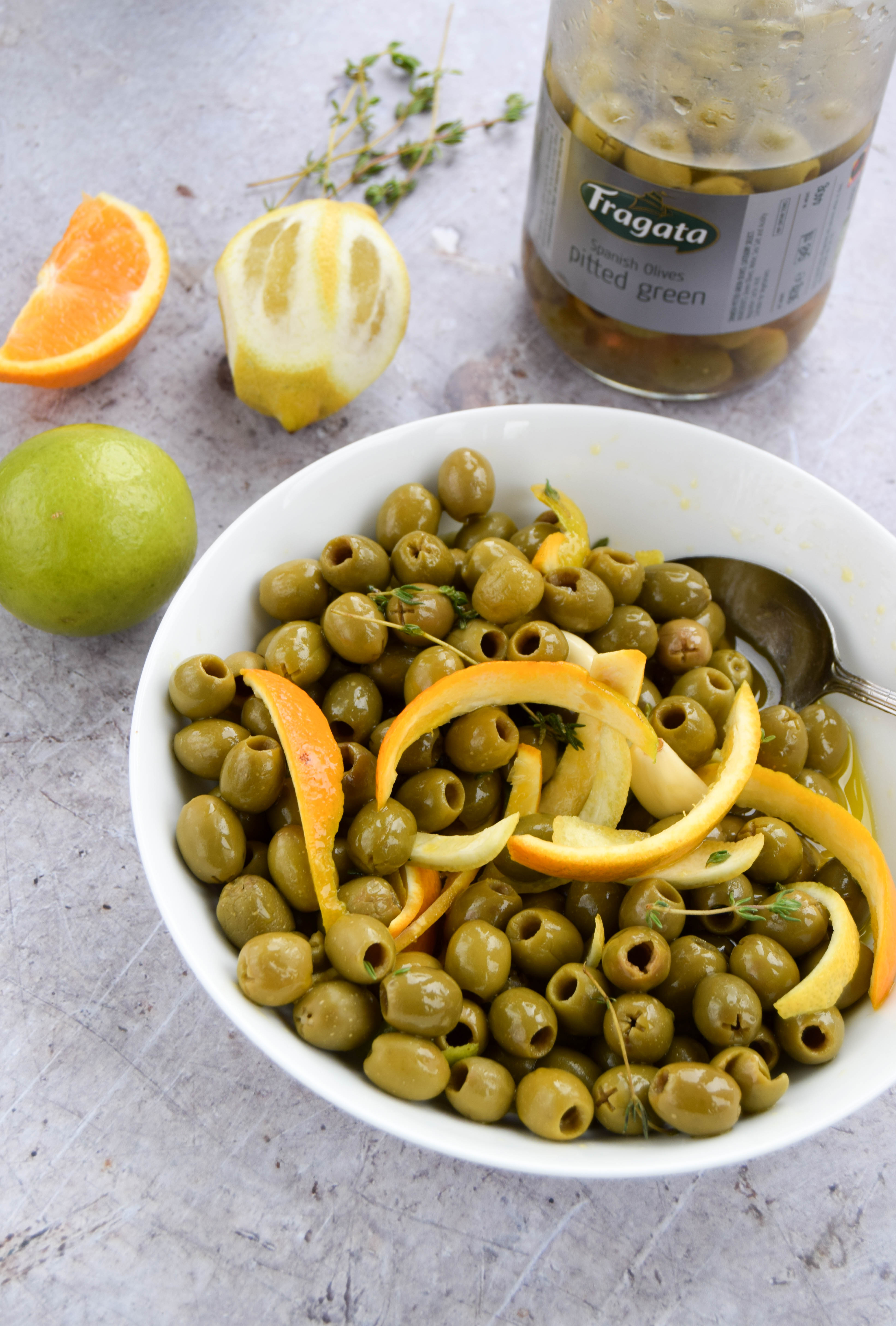 Sunshine-soaked olives are a staple of summer eating. Impress your friends with citrus marinated olives and the perfect martini for all your summer parties. Sunshine-soaked olives are a staple of summer eating. Impress your friends with citrus marinated olives and the perfect martini for all your summer parties.