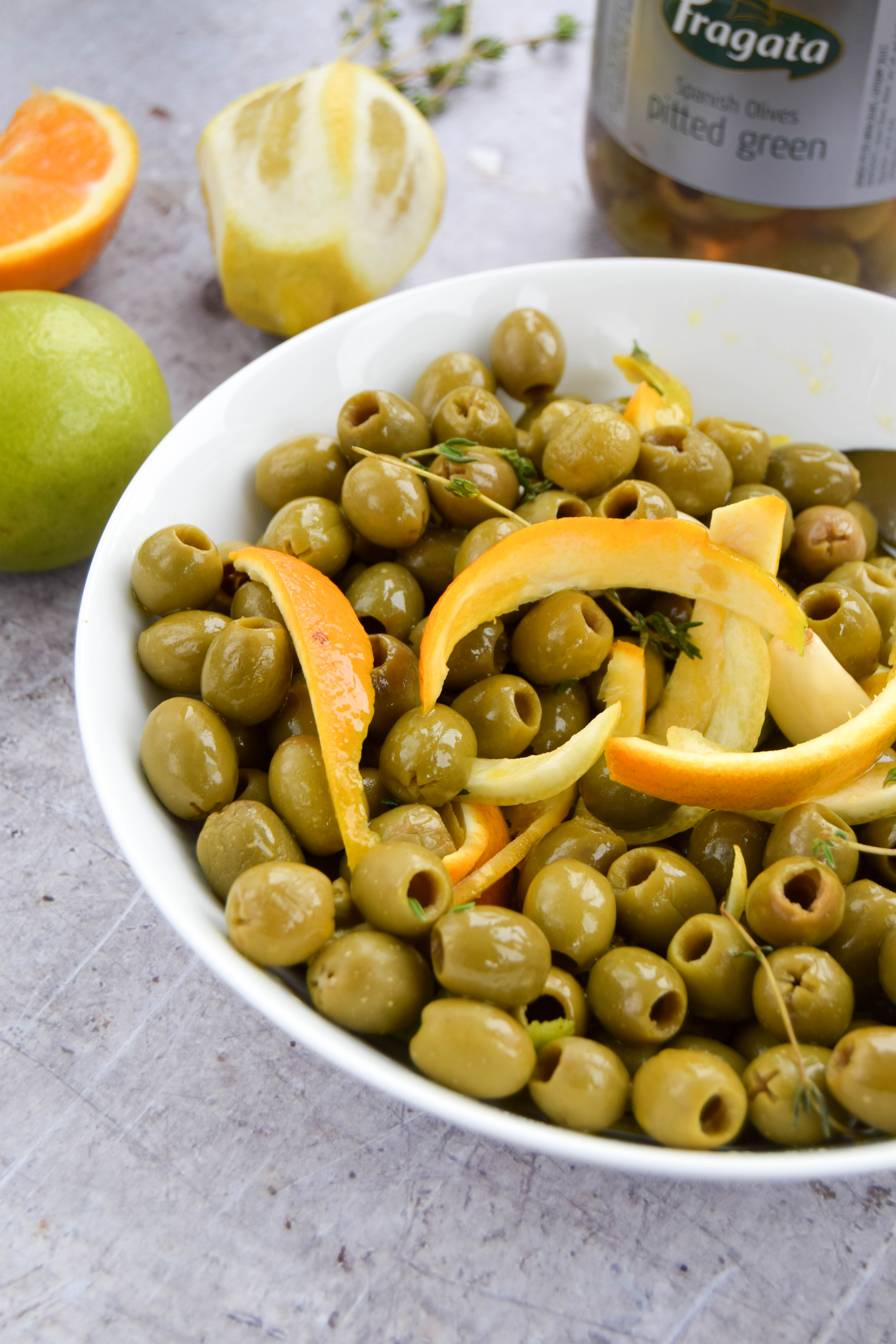 Sunshine-soaked olives are a staple of summer eating. Impress your friends with citrus marinated olives and the perfect martini for all your summer parties. Sunshine-soaked olives are a staple of summer eating. Impress your friends with citrus marinated olives and the perfect martini for all your summer parties.