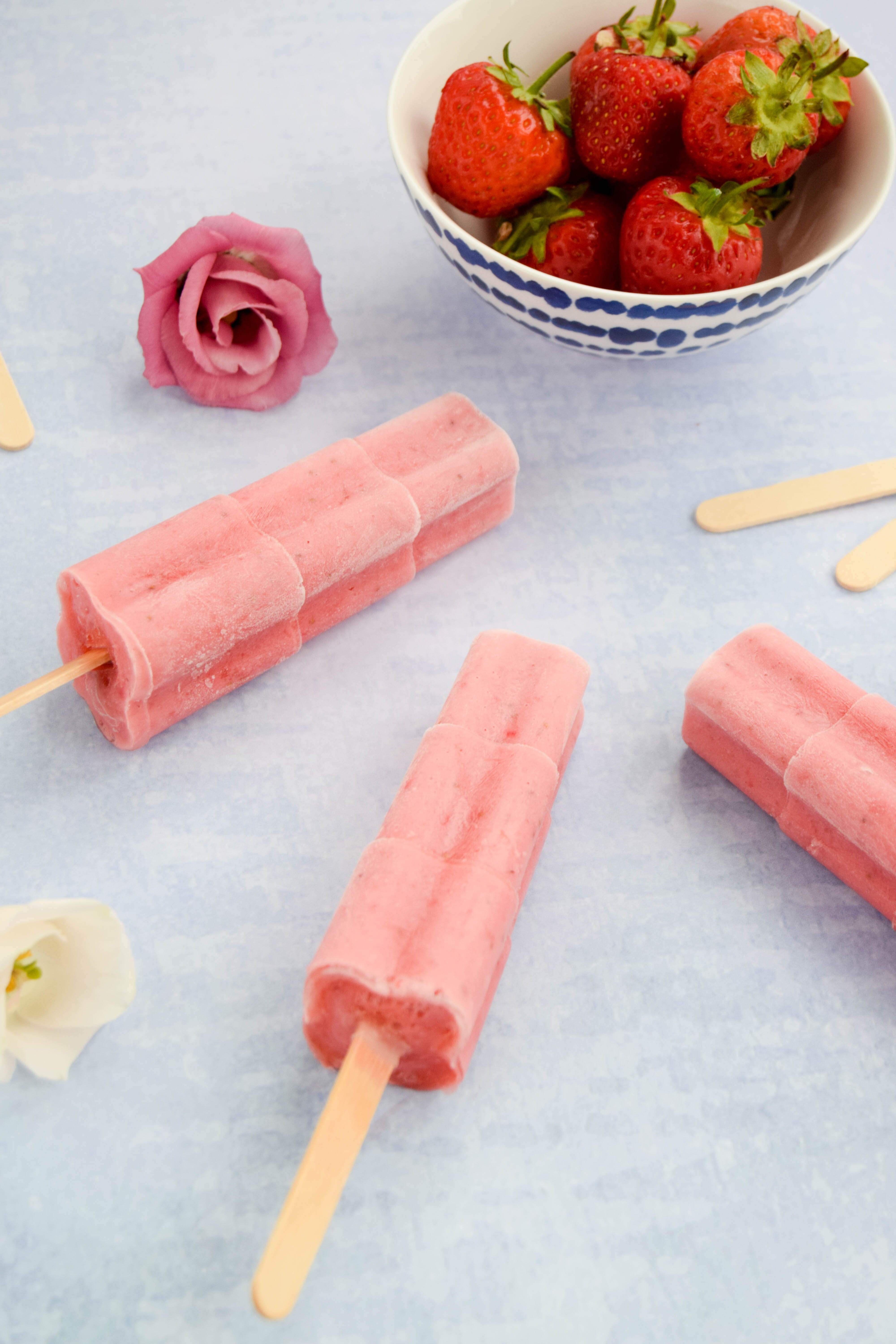 Fruity and refreshing homemade popsicles made using watermelon, strawberries, and quark that is naturally fat-free and high in protein. Fruity and refreshing homemade popsicles made using watermelon, strawberries, and quark that is naturally fat-free and high in protein.