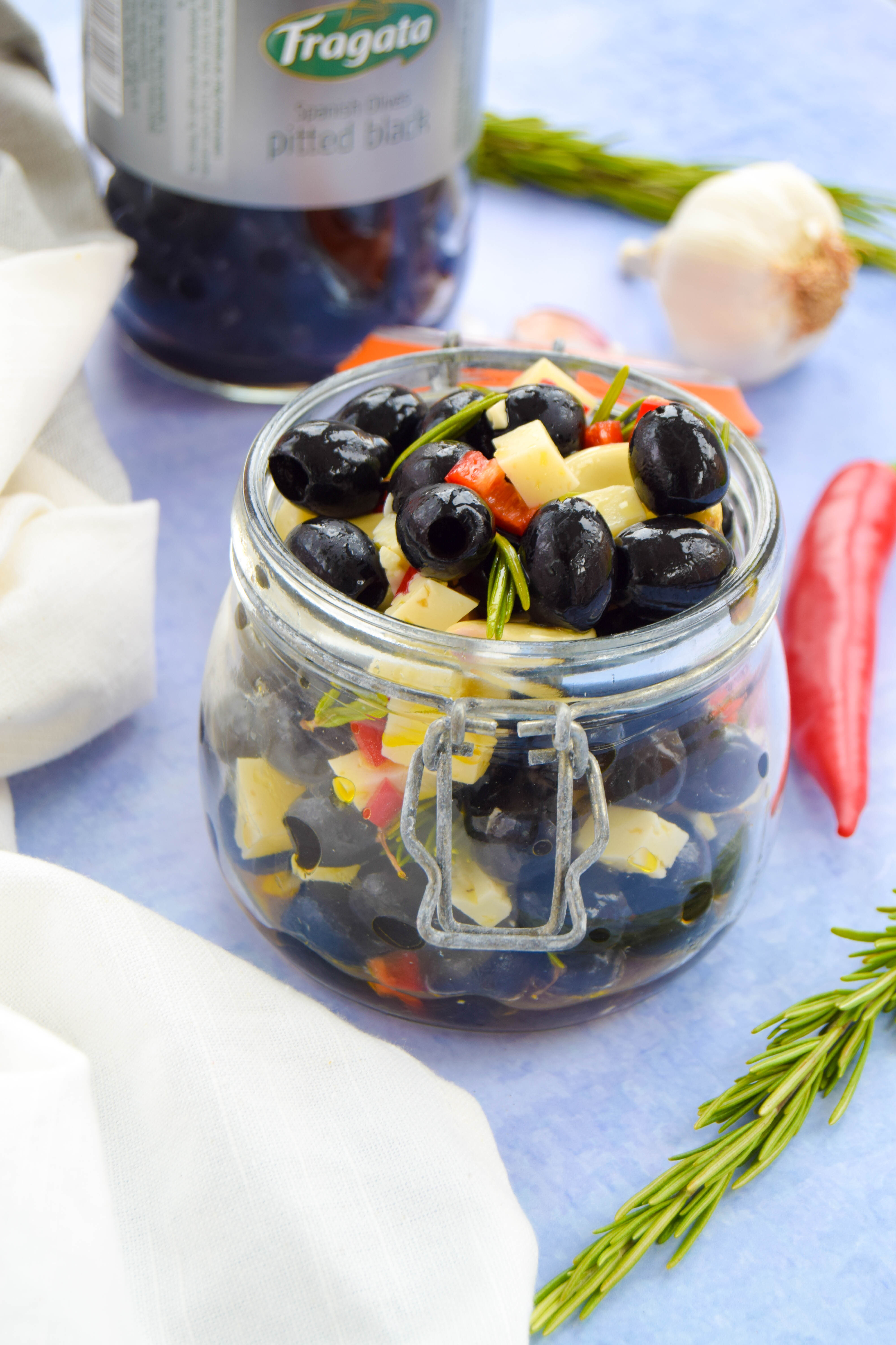 Craving a getaway or suffering a bout of holiday blues? Create a Spanish-style feast by marinating olives with a mix of fresh Mediterranean flavours. 