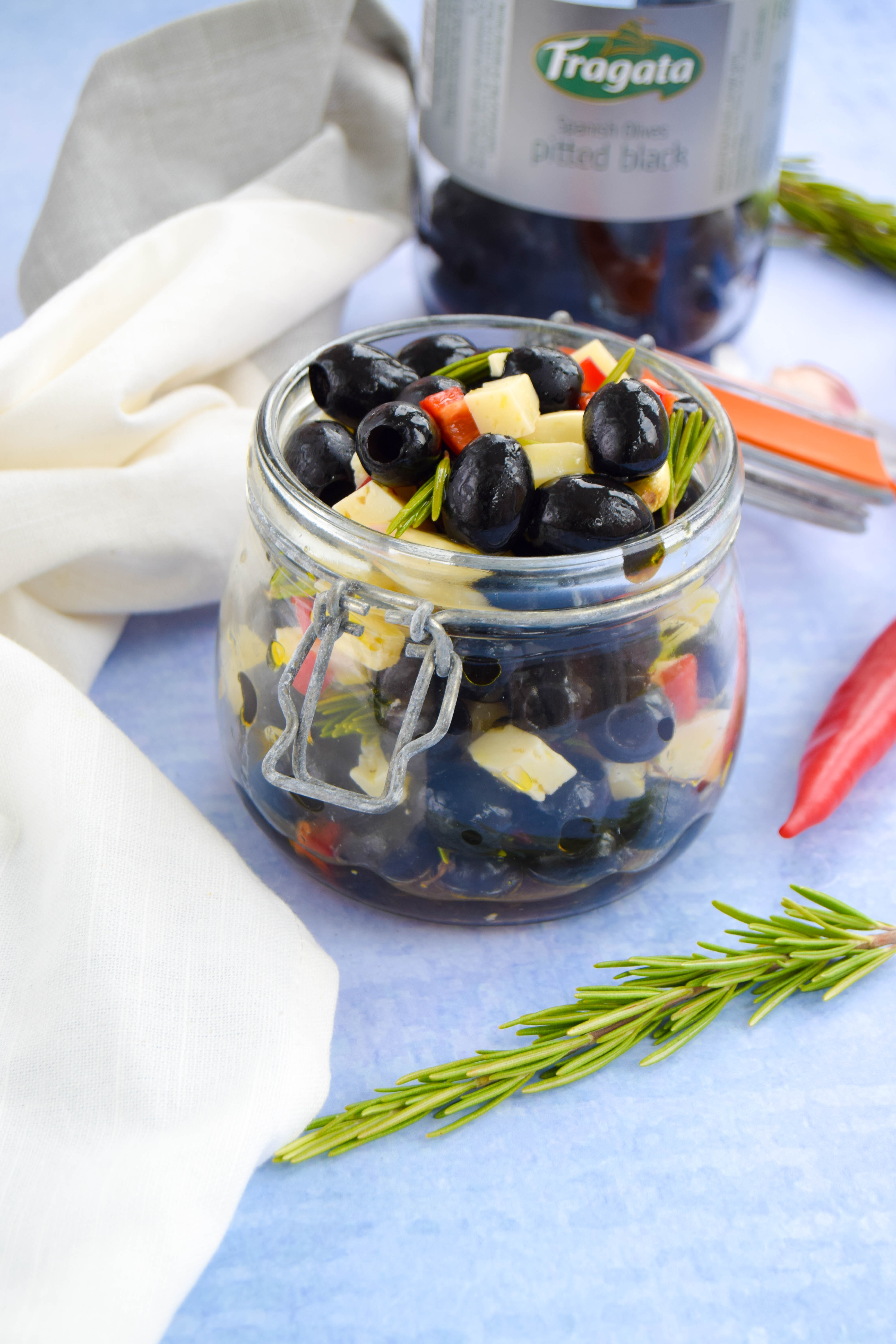 Craving a getaway or suffering a bout of holiday blues? Create a Spanish-style feast by marinating olives with a mix of fresh Mediterranean flavours. 