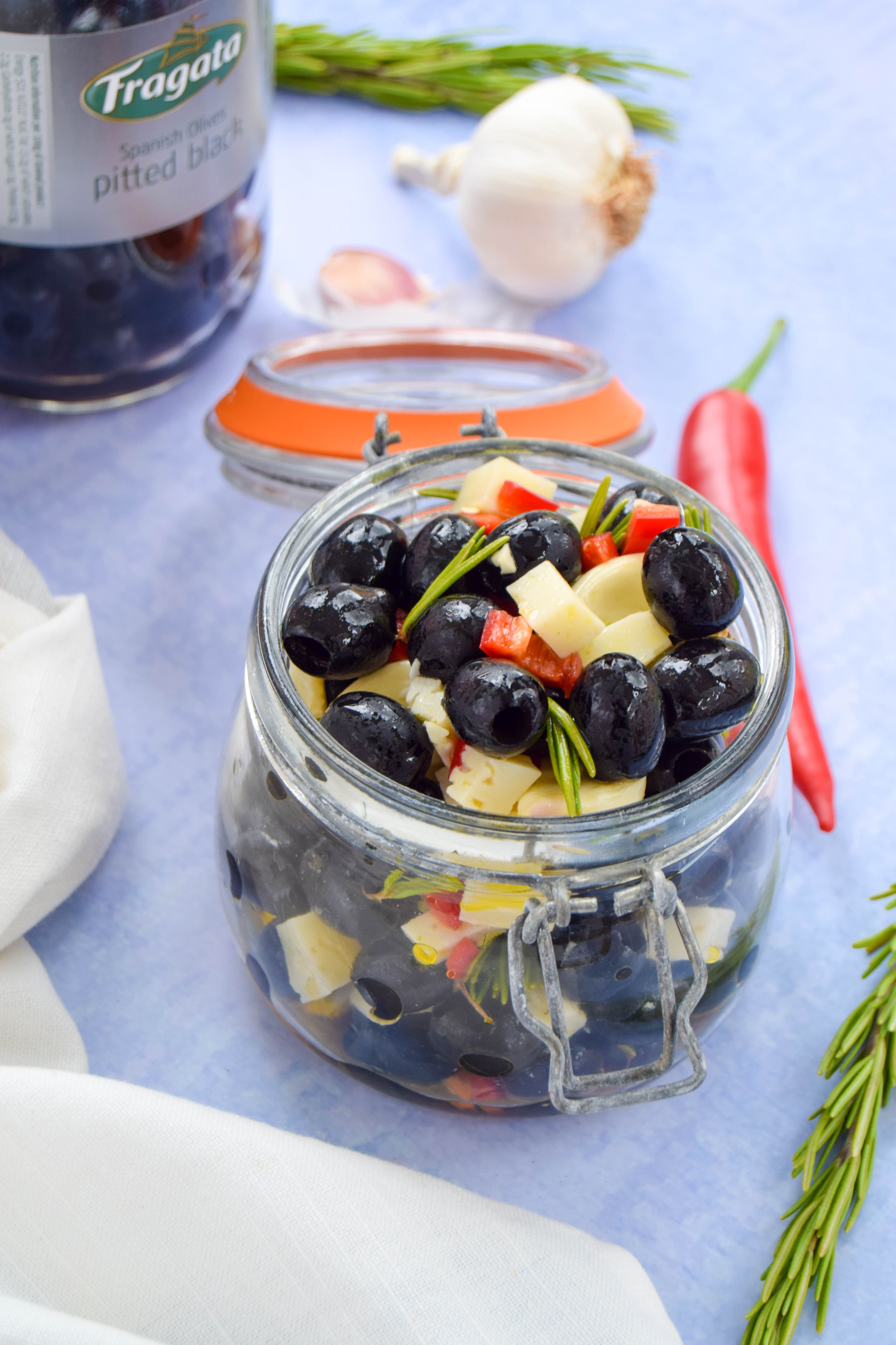 Craving a getaway or suffering a bout of holiday blues? Create a Spanish-style feast by marinating olives with a mix of fresh Mediterranean flavours. 