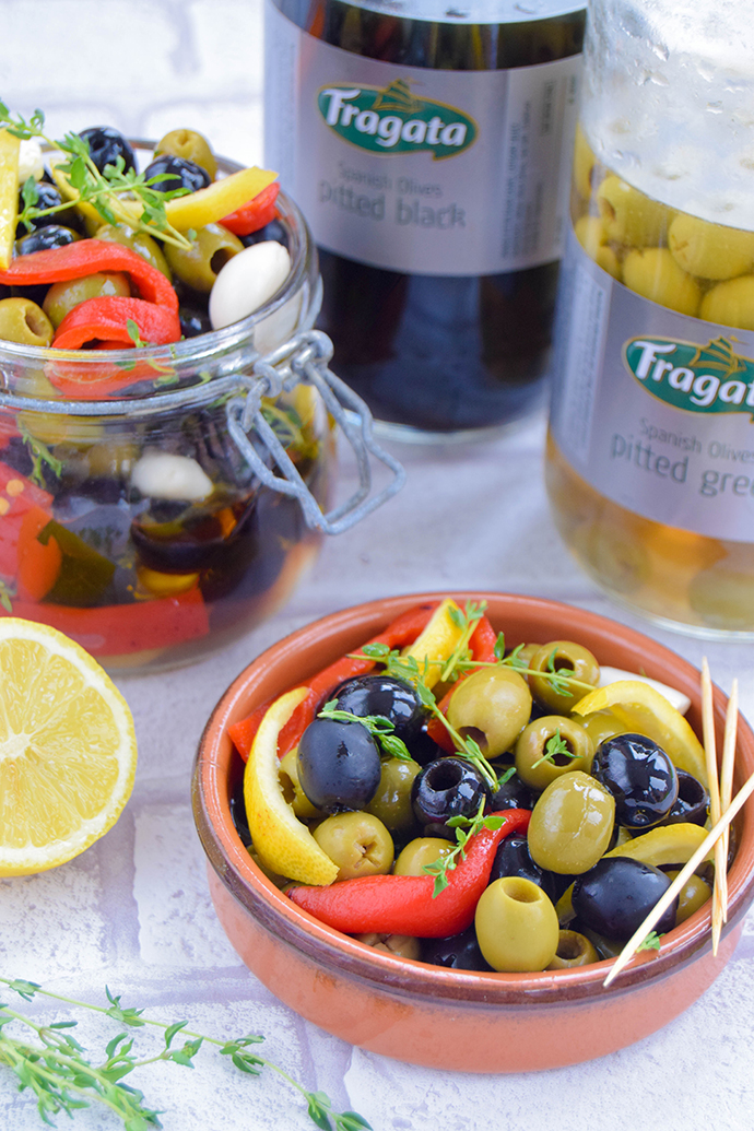 Is your summer a complete washout? Reclaim your summer, by bringing the sunshine indoors with these Mediterranean pickled olives with roasted red peppers and garlic.
