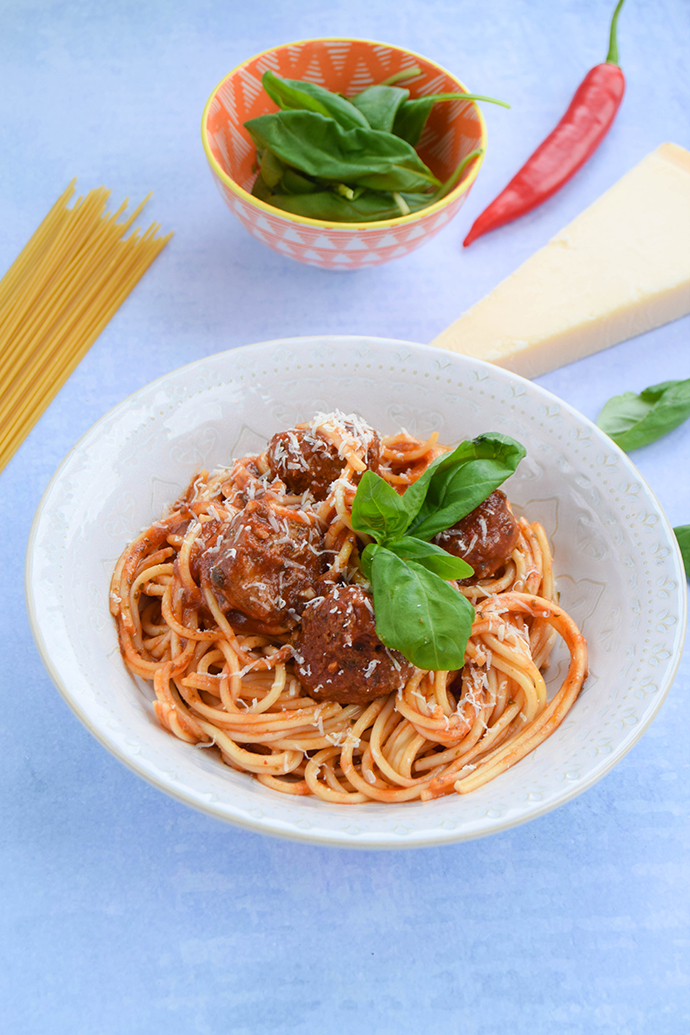 An easy weeknight meal of homemade meatballs flavoured with lots of herbs and garlic and cooked in a deliciously rich tomato sauce.