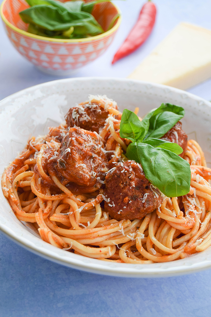 An easy weeknight meal of homemade meatballs flavoured with lots of herbs and garlic and cooked in a deliciously rich tomato sauce.
