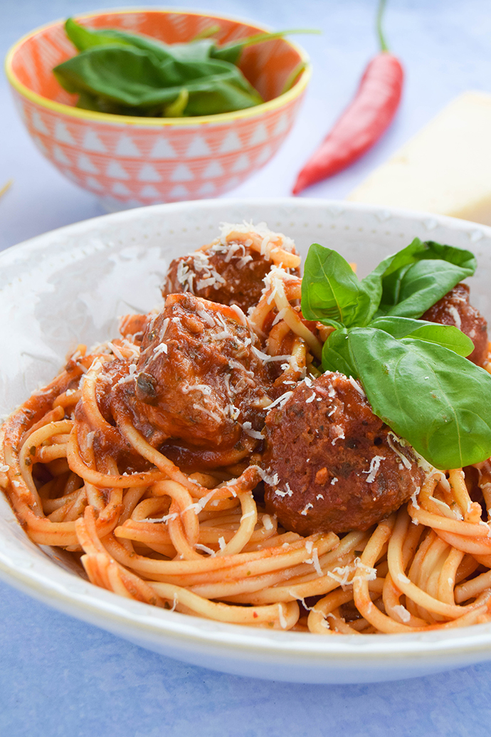 An easy weeknight meal of homemade meatballs flavoured with lots of herbs and garlic and cooked in a deliciously rich tomato sauce.