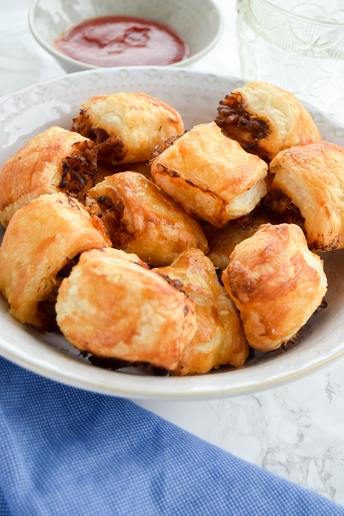 Slow cooked pulled pork flavoured with sweet and smokey Cajun spices traditional to Louisiana add a delicious twist to a traditional sausage roll. Slow cooked pulled pork flavoured with sweet and smokey Cajun spices traditional to Louisiana add a delicious twist to a traditional sausage roll.