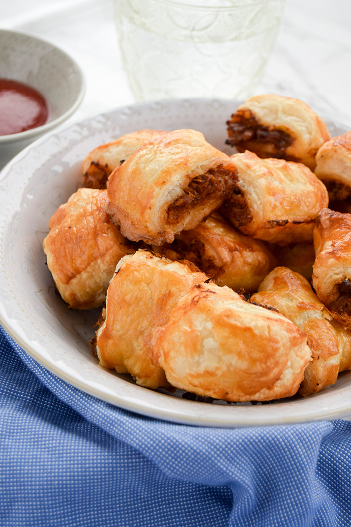 Slow cooked pulled pork flavoured with sweet and smokey Cajun spices traditional to Louisiana add a delicious twist to a traditional sausage roll. Slow cooked pulled pork flavoured with sweet and smokey Cajun spices traditional to Louisiana add a delicious twist to a traditional sausage roll.