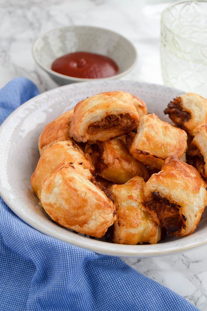 Slow cooked pulled pork flavoured with sweet and smokey Cajun spices traditional to Louisiana add a delicious twist to a traditional sausage roll. Slow cooked pulled pork flavoured with sweet and smokey Cajun spices traditional to Louisiana add a delicious twist to a traditional sausage roll.
