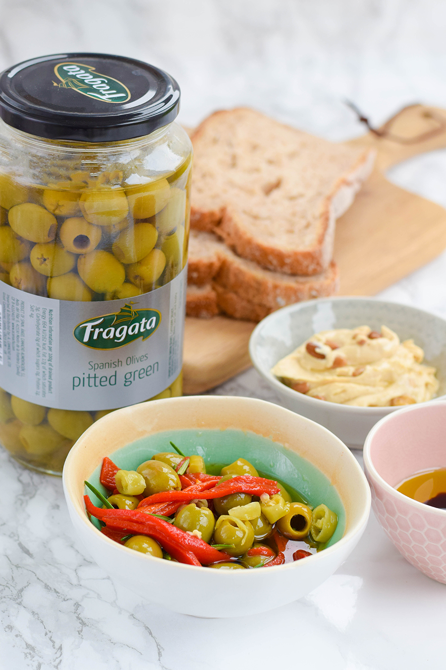 Pitted olives with rosemary and mixed peppers are a wonderful&nbsp;addition to any mezze style lunch or dinner that you may be throwing.&nbsp;