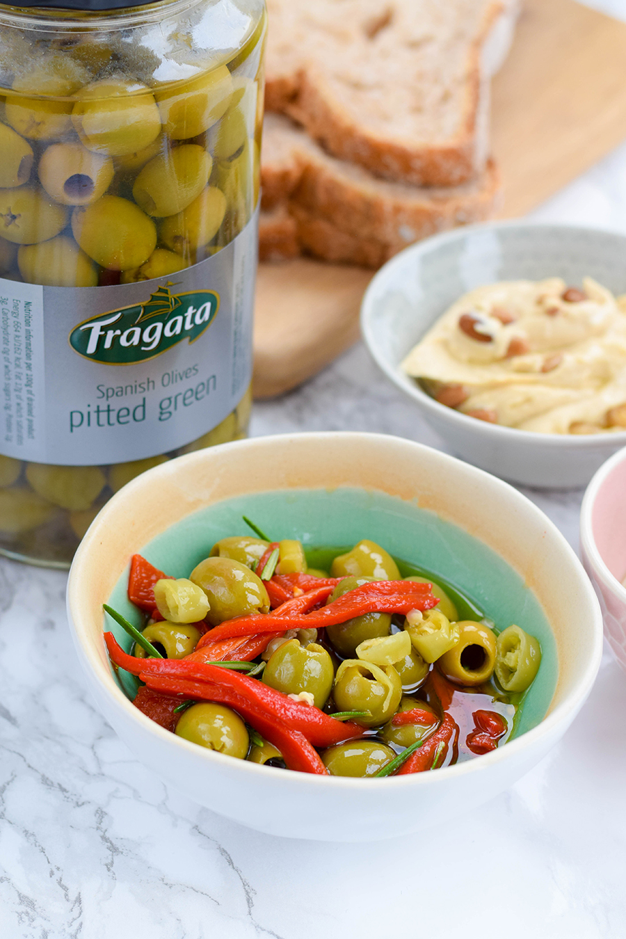 Pitted olives with rosemary and mixed peppers are a wonderful&nbsp;addition to any mezze style lunch or dinner that you may be throwing.&nbsp;