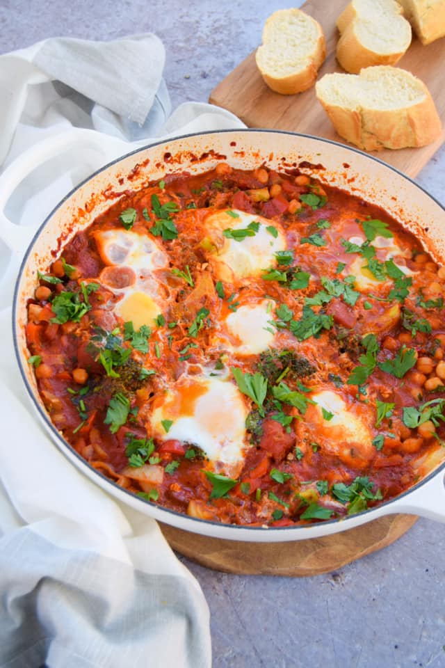 Dive into this vegetable packed&nbsp;shakshuka&nbsp;recipe that is mildly spiced with delicious North African flavours like harissa.&nbsp; It's a great one to create for a special brunch when friends and family come over.&nbsp; Serve it in the pan and let everyone tear off some crusty bread and dig into those runny egg yolks and tomato stew.&nbsp;